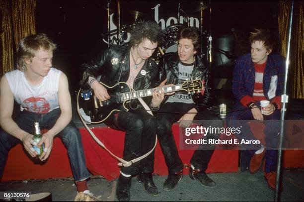 Photo of Johnny ROTTEN and Steve JONES and Sid VICIOUS and SEX PISTOLS, Paul Cook, Sid Vicious, Steve Jones & Johnny Rotten posed, group shot,...