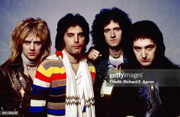 Circa 1977: NASSAU COLISEUM Photo of QUEEN and Roger TAYLOR and Freddie MERCURY and Brian MAY and John DEACON, Posed studio group portrait L-R Roger...