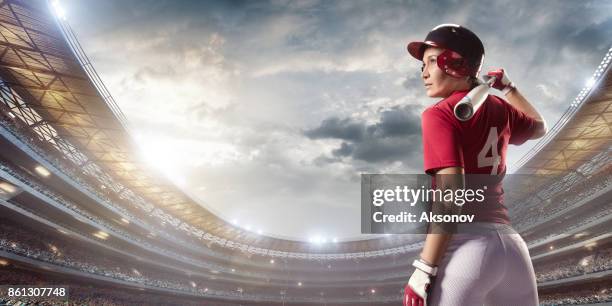 softball female player on a professional arena - softball glove stock pictures, royalty-free photos & images