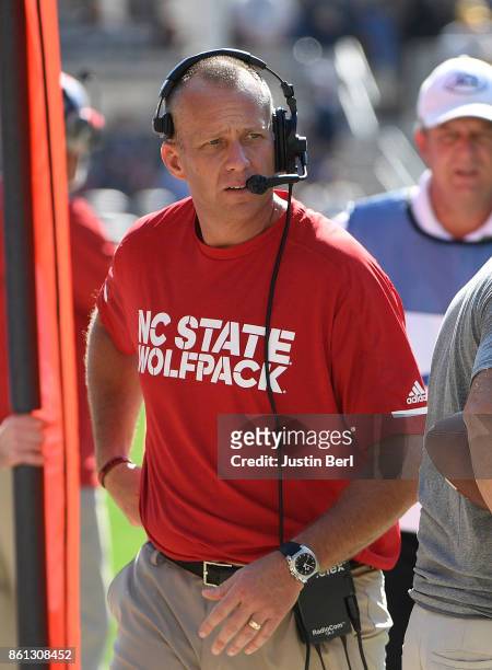 Head Coach Dave Doeren of the North Carolina State Wolfpack on the sidelines in the first half during the game against the Pittsburgh Panthers at...