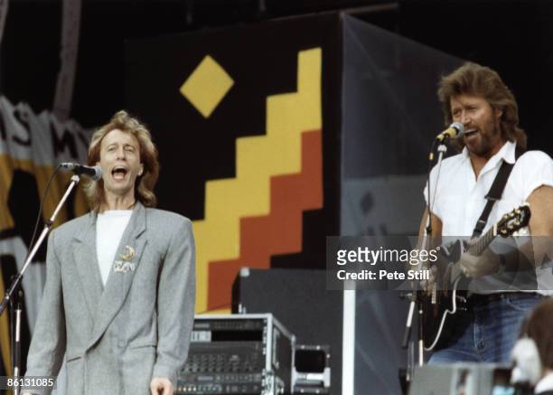 Photo of BEE GEES and Robin GIBB and Barry GIBB, Robin and Barry Gibb performing on stage at the Nelson Mandela 70th Birthday Tribute concert