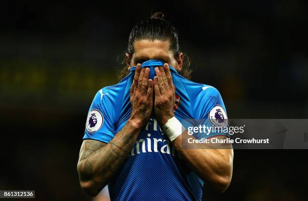 Hector Bellerin of Arsenal reacts during the Premier League match between Watford and Arsenal at Vicarage Road on October 14, 2017 in Watford,...