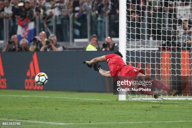 Lazio goalkeeper Thomas Strakosha saves the ball on penalty kick shooter by Juventus forward Paulo Dybala during the Serie A football match n.8...