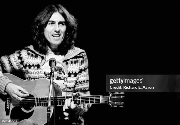 Photo of George HARRISON; George Harrison performing on Saturday Night Live, acoustic guitar