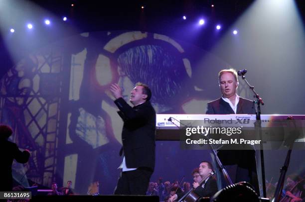 Photo of OMD and Andy McCLUSKEY and Paul HUMPHREYS, Andy McCluskey and Paul Humphreys performing on stage at the Night of the Proms