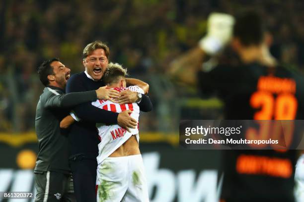 Leipzig Head Coach / Manager, Ralph Hasenhuttl celebrates victory with Kevin Kampl after the Bundesliga match between Borussia Dortmund and RB...