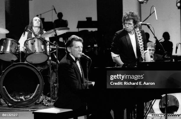 Photo of Jerry Lee LEWIS; L-R: Mick Fleetwood, Jerry Lee Lewis, Keith Richards performing together on 'Saturday Night Live'