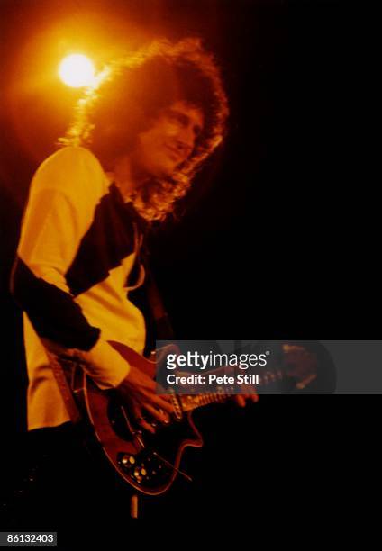 Photo of QUEEN and Brian MAY, Brian May performing live onstage