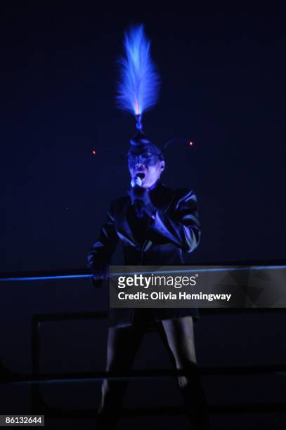 Photo of Grace JONES, Grace Jones performing on stage as part of the Meltdown Festival, costume