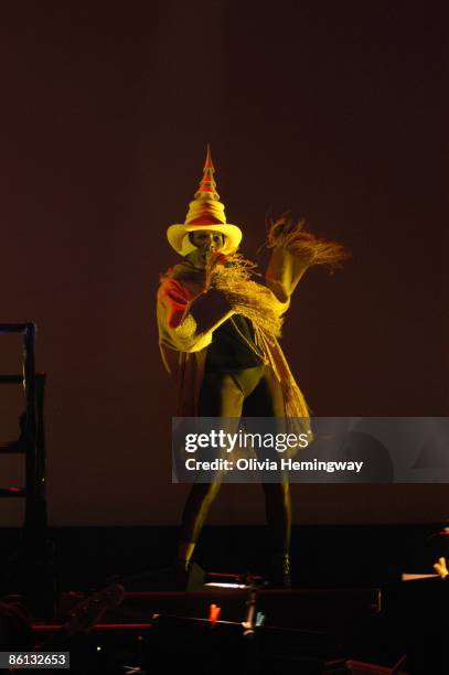 Photo of Grace JONES, Grace Jones performing on stage as part of the Meltdown Festival, costume