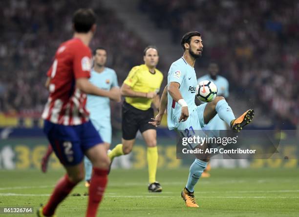 Barcelona's Portuguese midfielder Andre Gomes controls the ball during the Spanish league football match Club Atletico de Madrid vs FC Barcelona at...