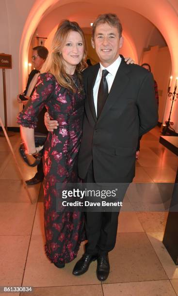 Amy Gadney and Tim Bevan attend a cocktail reception at the 61st BFI London Film Festival Awards at Banqueting House on October 14, 2017 in London,...