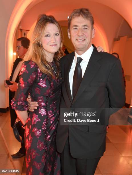 Amy Gadney and Tim Bevan attend a cocktail reception at the 61st BFI London Film Festival Awards at Banqueting House on October 14, 2017 in London,...