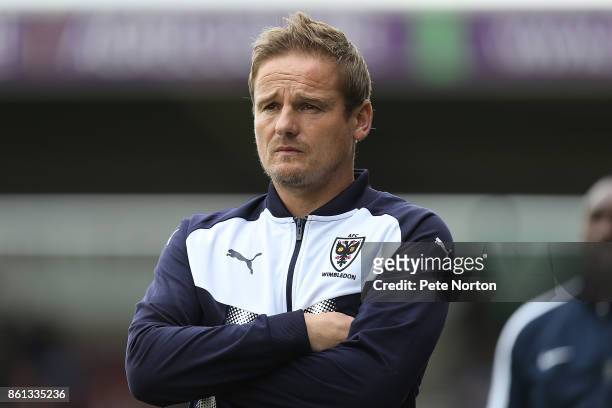 Wimbledon manager Neal Ardley looks on during the Sky Bet League One match between Northampton Town and A.F.C. Wimbledon at Sixfields on October 14,...