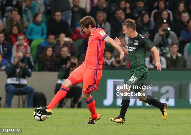 Sergei Petrov of FC Krasnodar is challenged by Mario Fernandes of FC CSKA Moscow during the Russian Premier League match between FC Krasnodar v FC...