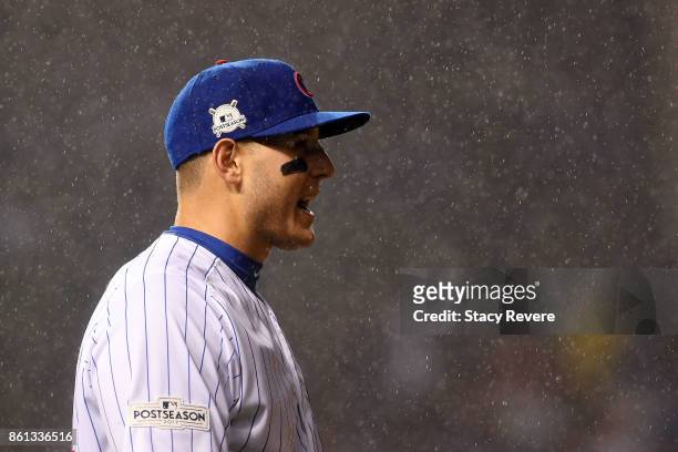 Anthony Rizzo of the Chicago Cubs watches action during game four of the National League Division Series against the Washington Nationals at Wrigley...
