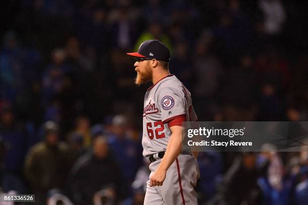 Sean Doolittle of the Washington Nationals prepares to throw a pitch during game four of the National League Division Series against the Chicago Cubs...