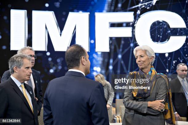 Christine Lagarde, managing director of the International Monetary Fund , right, and David Lipton, first deputy managing director of the IMF, left,...