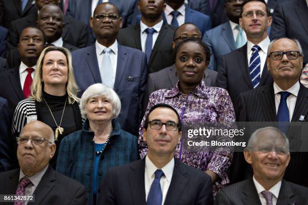Janet Yellen, chair of the U.S. Federal Reserve, second left, stands next to Steven Mnuchin, U.S. Treasury secretary, center, and Wolfgang Schaeuble,...