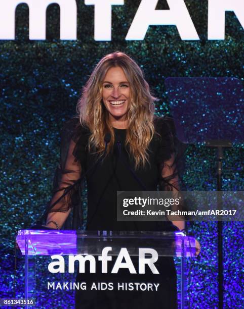 Julia Roberts speaks onstage at amfAR Los Angeles 2017 at Ron Burkle's Green Acres Estate on October 13, 2017 in Beverly Hills, Californi