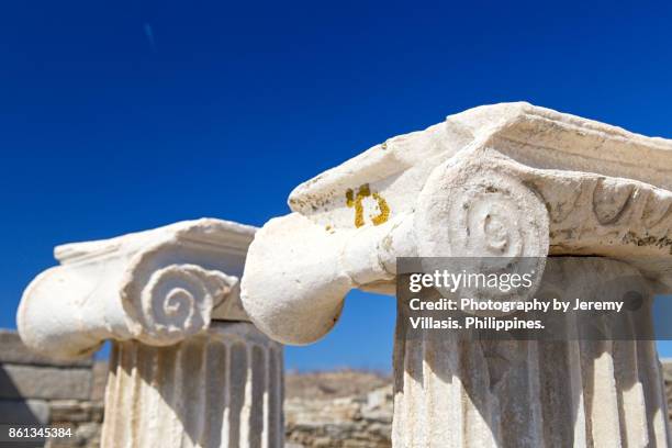 temple of apollo, delos, cyclades islands, southern aegean, greece - delos stock-fotos und bilder