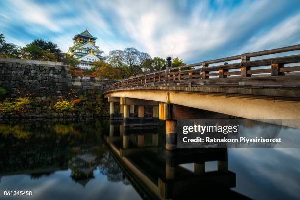 osaka castle in morning - stadt osaka stock-fotos und bilder