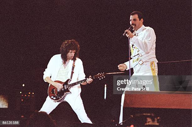 Photo of Freddie MERCURY and Brian MAY and QUEEN, L-R: Brian May and Freddie Mercury performing live on stage