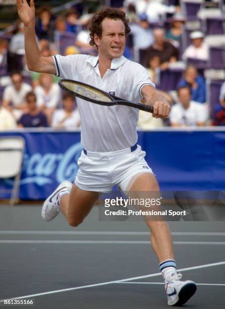 John McEnroe of the USA in action during the Volvo International tennis tournament at the Stratton Mountain Resort in Windham County, USA circa...