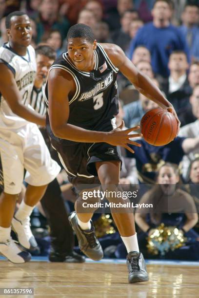 Ryan Gomes of the Providence Friars looks to pass the ball during a quarterfinal Men's Big East Men's Basketball Tournament game against the...