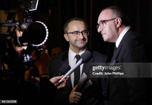 Andrey Zvyagintsev and Alexander Rodnyansky in the winners room with their Official Competition Best Film award for 'Loveless' at the 61st BFI London...