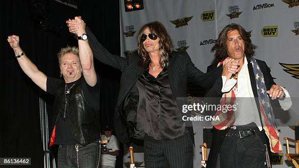 Photo of AEROSMITH and Joey KRAMER and Steven TYLER and Joe PERRY, L-R Joey Kramer, Steven Tyler and Joe Perry at a press conference to launch the...