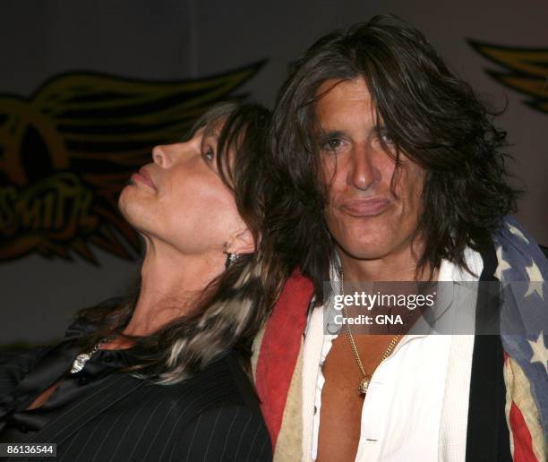 Photo of AEROSMITH and Steven TYLER and Joe PERRY, Steven Tyler and Joe Perry at a press conference to launch the 'Guitar Hero: Aerosmith' video game