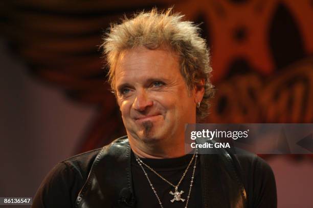 Photo of AEROSMITH and Joey KRAMER, Portrait of Joey Kramer at a press conference to launch the 'Guitar Hero: Aerosmith' video game