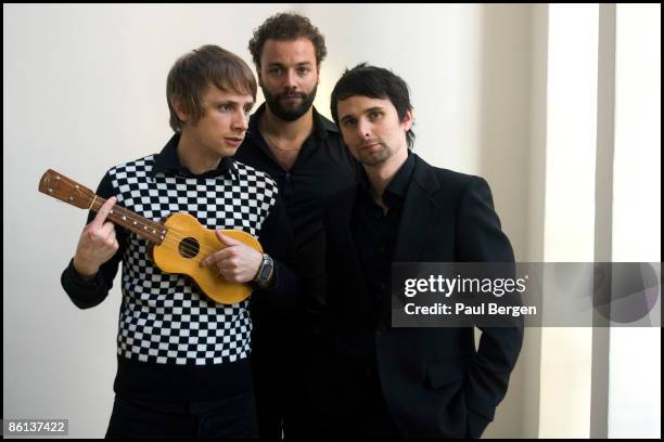 Photo of Chris WOLSTENHOLME and MUSE and Dominic HOWARD and Matt BELLAMY; L-R: Dominic Howard, Chris Wolstenholme, Matt Bellamy