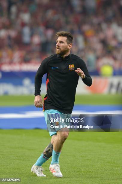 Lionel Messi of Barcelona warms up before the match between Atletico Madrid and Barcelona as part of La Liga at Wanda Metropolitano Stadium on...