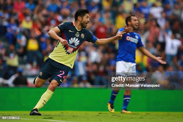 Oribe Peralta of America celebrates after scoring the second goal of his team during the 13th round match between Cruz Azul and America as part of...