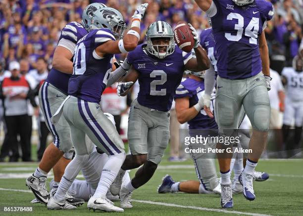 Defensive back D.J. Reed of the Kansas State Wildcats reacts after recovering a fumble against the TCU Horned Frogs during the first half on October...
