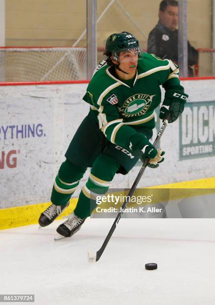 Randy Hernandez of the Sioux City Musketeers skates with the puck during the game against the Cedar Rapids RoughRiders on Day 1 of the USHL Fall...