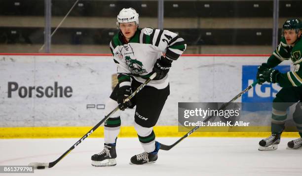 Ikya Sushko of the Cedar Rapids RoughRiders skates with the puck during the game against the Sioux City Musketeers on Day 1 of the USHL Fall Classic...