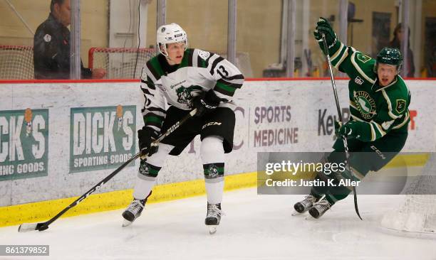 Nathan Smith of the Cedar Rapid RoughRiders skates with the puck during the game against the Sioux City Musketeers on Day 1 of the USHL Fall Classic...