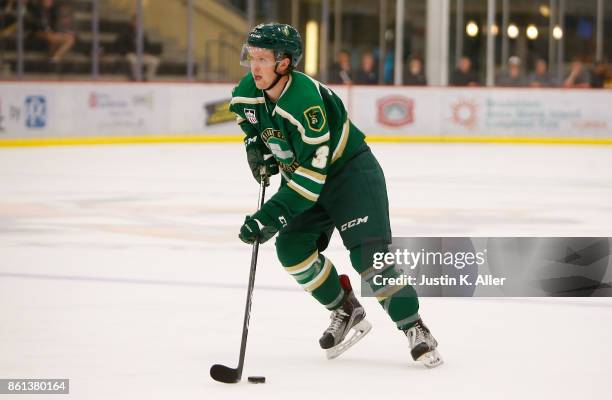 Luke Johnson of the Sioux City Musketeers skates with the puck during the game against the Cedar Rapids RoughRiders on Day 1 of the USHL Fall Classic...