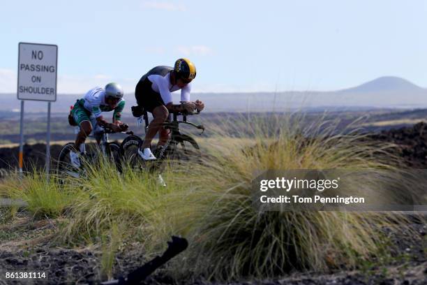 Cameron Wurf of Australia cycles ahead of Lionel Sanders of Canada during the IRONMAN World Championship on October 14, 2017 in Kailua Kona, Hawaii.