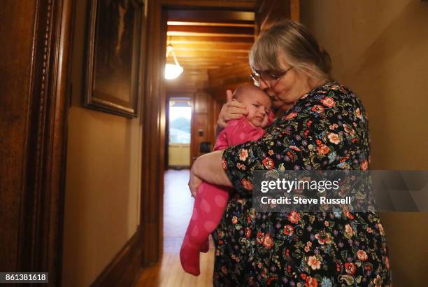 Linda Boyle gives her granddaughter, Grace, a kiss. Joshua Boyle's children in their grandparents home after arriving back in Canada after Joshua and...