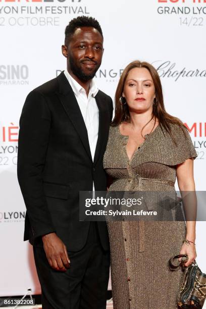 Thomas Ngijol and his wife Karole Rocher attend opening ceremony of 9th Film Festival Lumiere In Lyon on October 14, 2017 in Lyon, France.