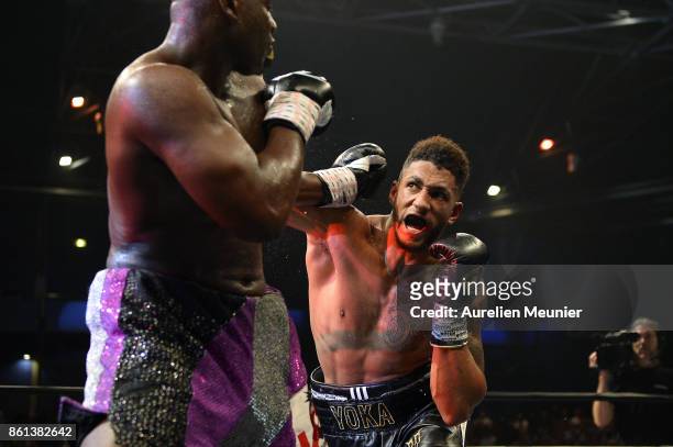 Tony Yoka of France and Jonathan Rice of The United States of America in action during an international heavyweight boxing match at Zenith on October...