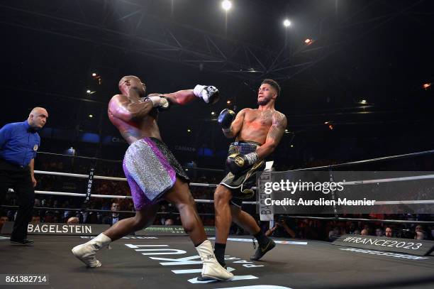 Tony Yoka of France and Jonathan Rice of The United States of America in action during an international heavyweight boxing match at Zenith on October...