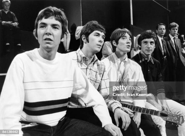 From left, Ronnie Lane, Ian McLagan, Steve Marriott, Kenney Jones of English rock group Small Faces seated on the set of the Associated Rediffusion...