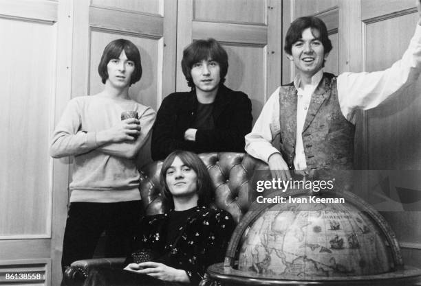 English rock group Small Faces posed around a leather armchair in London in April 1968. Members of the band are, from left, keyboard player Ian...