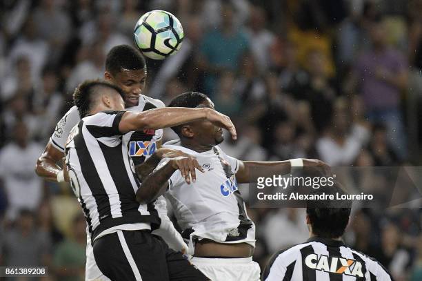 Madson of Vasco da Gama battles for the ball with Victor Luis of Botafogo during the match between Vasco da Gama and Botafogo as part of Brasileirao...