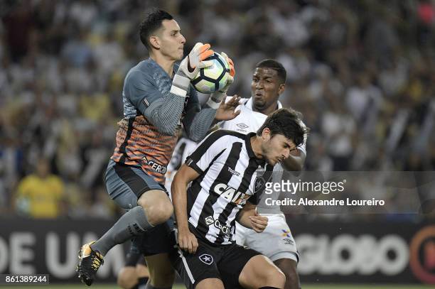 Thalles of Vasco da Gama battles for the ball with Gatito FernÃ¡ndez and Igor Rabello of Botafogo during the match between Vasco da Gama and Botafogo...